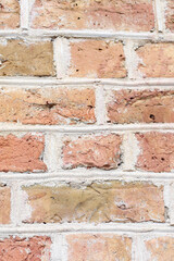 Orange house brick wall texture background with small details.
