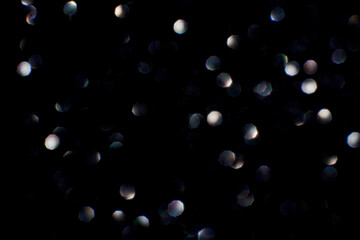 Bokeh circle with silver sparkles background. Grey glitter backdrop. Monochrome texture. New year luxury snow. Copyspace. Shimmer confetti wallpaper. Dreamy shiny design detail. For multiply