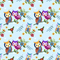Cute couple owl on branch with flowers seamless pattern.