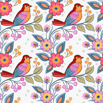Cute red bird on branch with flowers seamless pattern.
