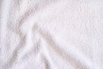 White towel texture. Fluffy carpet background. Blank bathroom textile. Warm sweater material. Soft...