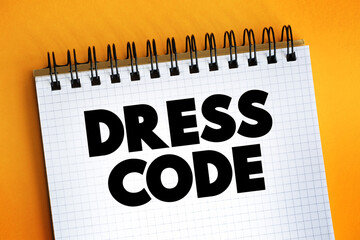 Dress Code text on notepad, concept background.