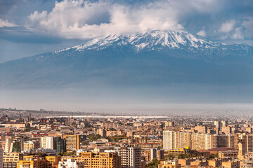 Spectacular telephoto zoom view of the city of Yerevan and Mount Ararat. The concept of real estate and construction investment in Armenia.