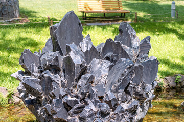 Black stone obsidian or volcanic glass. It was used by shamans of the Aztec tribe for sacrifices...