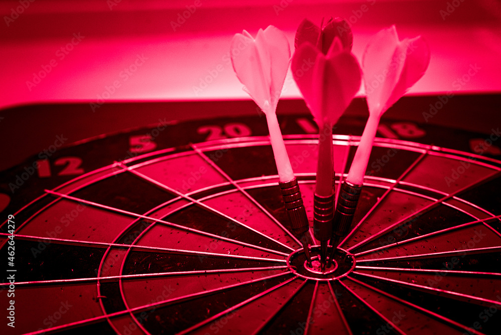 Poster bullseye is a target of business. dart is an opportunity and dartboard is the target and goal. so bo
