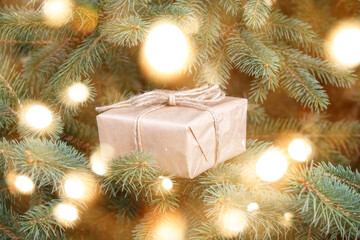 Fototapeta na wymiar Wrapped gifts on the a Christmas tree with copyspace. Christmas gift box