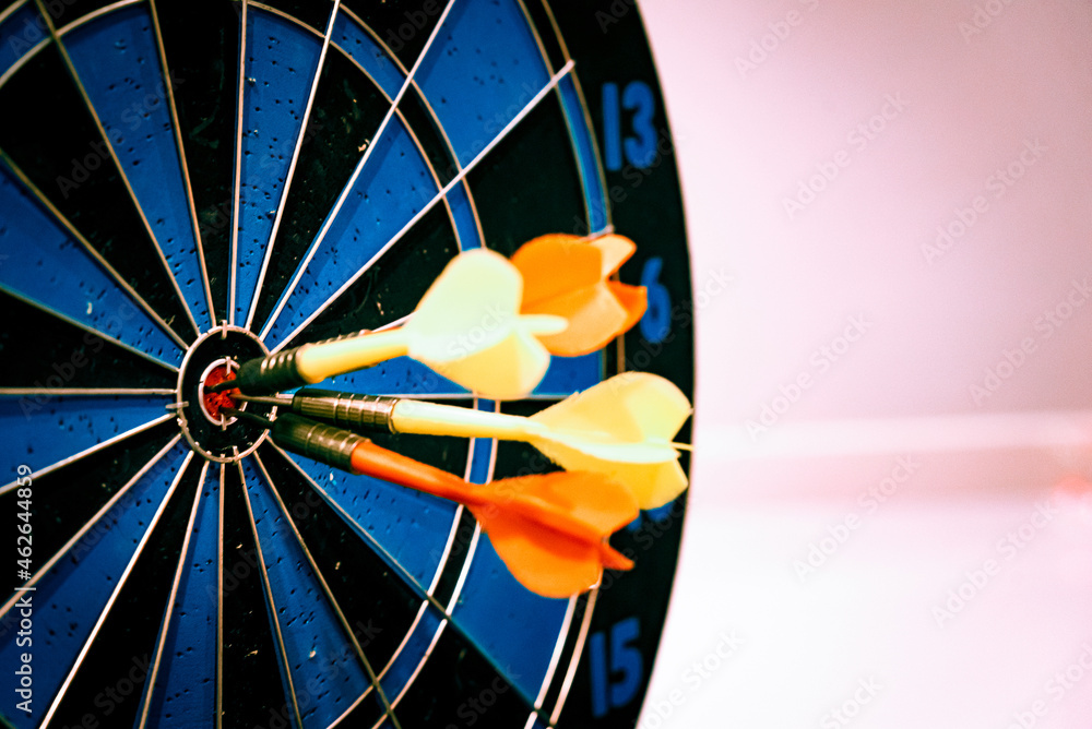 Poster bullseye is a target of business. dart is an opportunity and dartboard is the target and goal. so bo