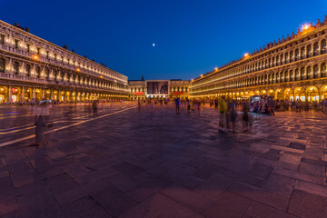 A long exposure image of Piazza San Marco at night in Venice, Italy