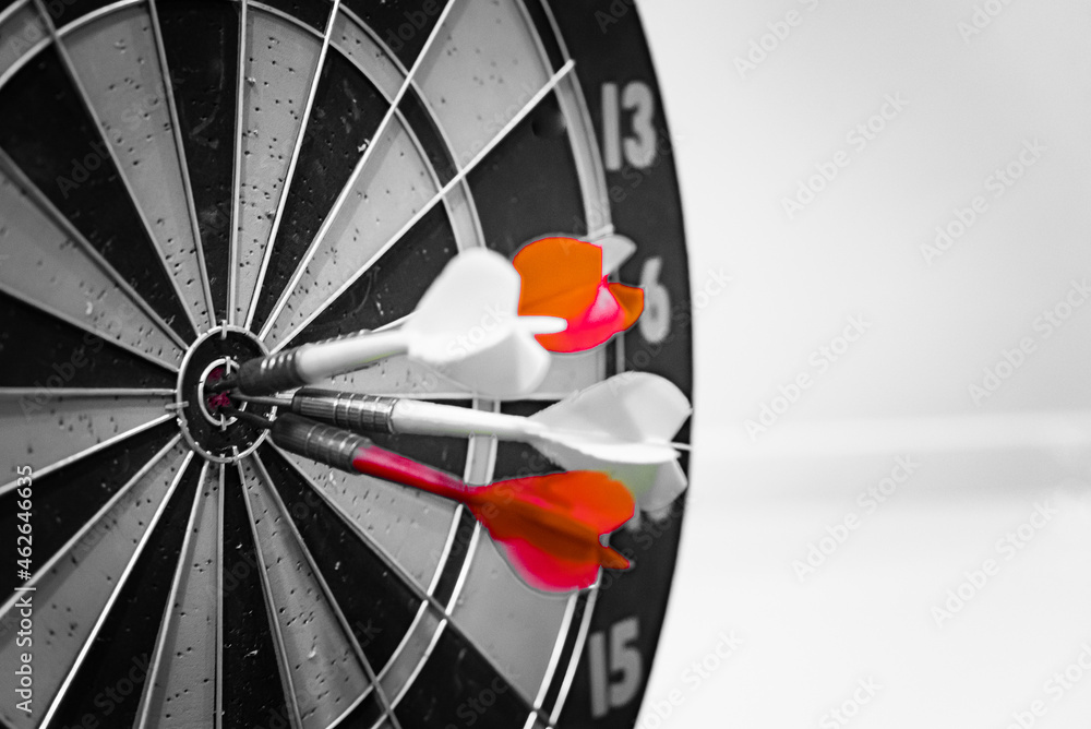 Poster bullseye is a target of business. dart is an opportunity and dartboard is the target and goal. so bo