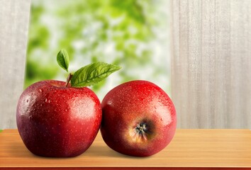 Fresh ripe sweet apple fruit on the desk