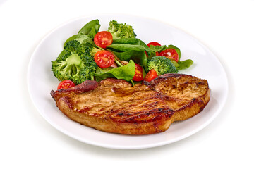 Grilled juicy steaks bbq with vegetable salad, isolated on white background.