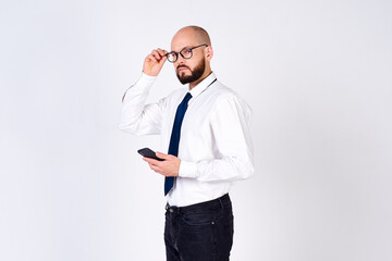 Elegant successful caucasian male businessman uses the phone.
