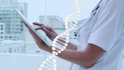 Animation of dna strand spinning over female doctor using tablet - Powered by Adobe