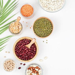 Vegan protein source. Beans, peas, chickpeas, lentils, mung bean, peanut in bowl on white background.