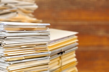 Old manuscripts lie in a stack, beautiful paper background,