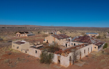 Aerial view of the hotel of the abandoned railway town called Putsonderwater, ghost town in South Africa.
