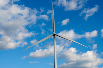wind turbine against blue sky