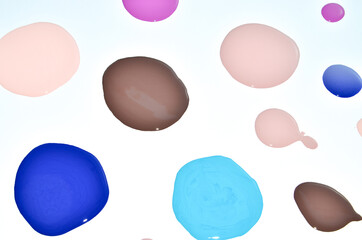 Nail polish (enamel) mixed multicolor samples, isolated on white background