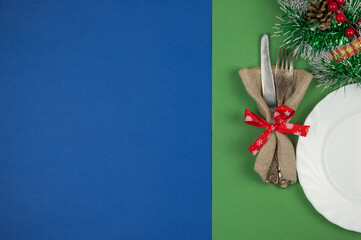 Vintage silverware decorated with red ribbon