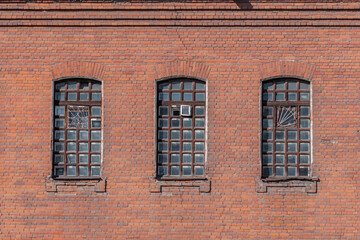 Old brick wall with windows background. Psychiatric hospital No. 3, the city of Novosibirsk	