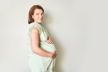 Obraz premium Pregnant woman visit doctor center. Gynecology maternity treatment. Vaccine bandage. Medical hospital. Health care check. Female patient. Pandemic concept