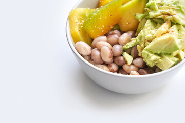 Eating healthy food. Organic calcium salad with vegetables and oil. Round plate. Home dinner or lunch. Vitamin cereal. Bowl at table