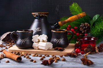 New Year's morning coffee. A sprig of a Christmas tree with red berries