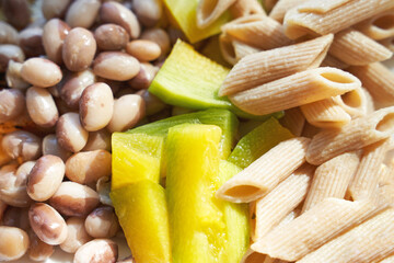 Eating healthy food. Organic calcium salad with vegetables and oil. Round plate. Home dinner or lunch. Vitamin cereal. Bowl at table