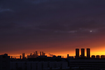 Fototapeta na wymiar Silhouettes of Moscow skyscrappers on the horizon on the sunset