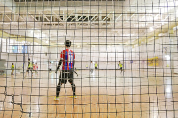 体育館でしているフットサルの風景