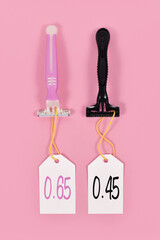 Pink tax and gender stereotypes concept showing pink and black razors marketed to specific genders...