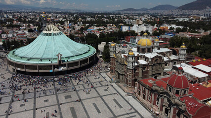 Aerial view of the sacred Basilica Virgin of Guadalupe with a lot of visitors during a sunny...