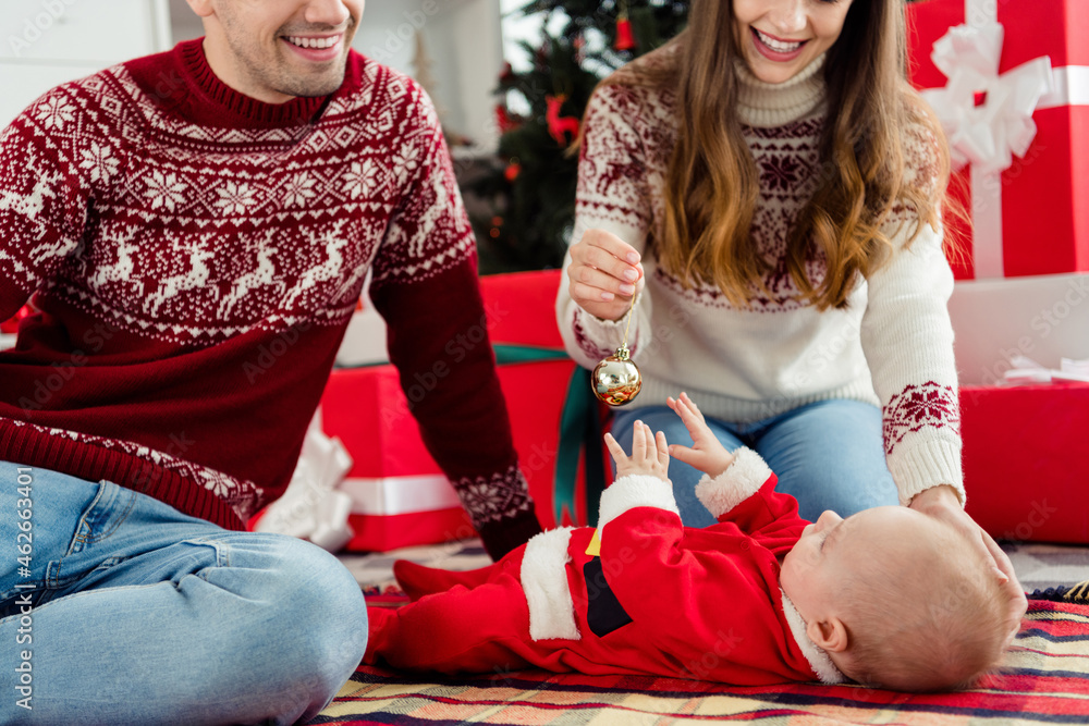 Sticker Cropped photo of young family happy positive smile play little kid tree toy new year noel decoration indoors