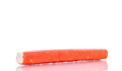 One frozen crab stick, close-up, isolated on white.