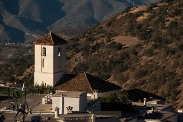 Fototapeta na wymiar Elevated view of the church of Capileira in the morning light, Las Alpujarras, Sierra Nevada National Park, Andalusia, Spain