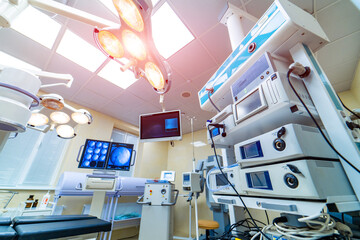 Modern medical light surgery room. Hospital operating technology equipment.