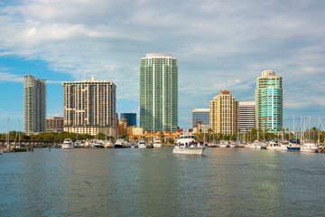Fototapeta na wymiar Modern city skyline including Signature Place, Bayfront Tower, One St. Petersburg and Ovation building from Demens Landing Park in downtown St. Petersburg, Florida FL, USA. 