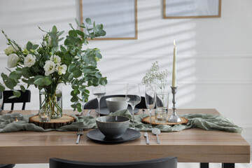 Fototapeta na wymiar Festive table setting with beautiful tableware and decor indoors