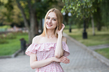 Portrait of a young and attractive Caucasian blonde girl. Good looking