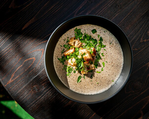cream soup with mushrooms and crouutons