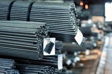 Hot rolled steel, bundle of round metal rods close-up