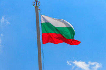 Waving flag of Bulgaria against blue sky