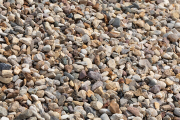 pebble stone crush production. Crushed stone fine gravel as background and texture