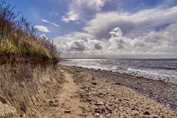 Dranske, Germany, steep coast, gravel, sandy beach of the island of Ruegen.