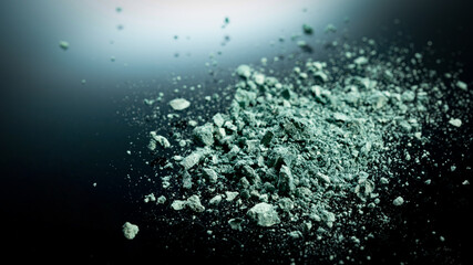 Makeup powder close-up on black background