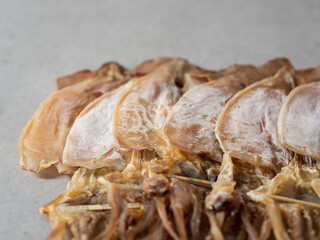 Close-up of dried squid on marble background