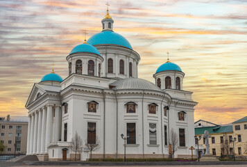 Fototapeta na wymiar White cathedral with blue domes against the sunset, Kazanskiy Cathedral, Kazan, Russia