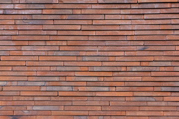 Obraz premium mur de brique orange rosatre
