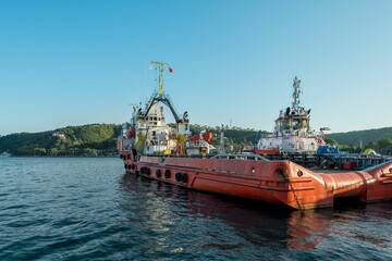 Tugboats moored on the shore of the Bosphorus channel north of Istanbul