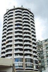 Fototapeta premium Colossal building in Benidorm city under cloudy sky